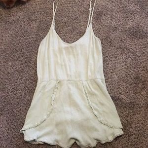 Green Foreign Exchange romper. Small.